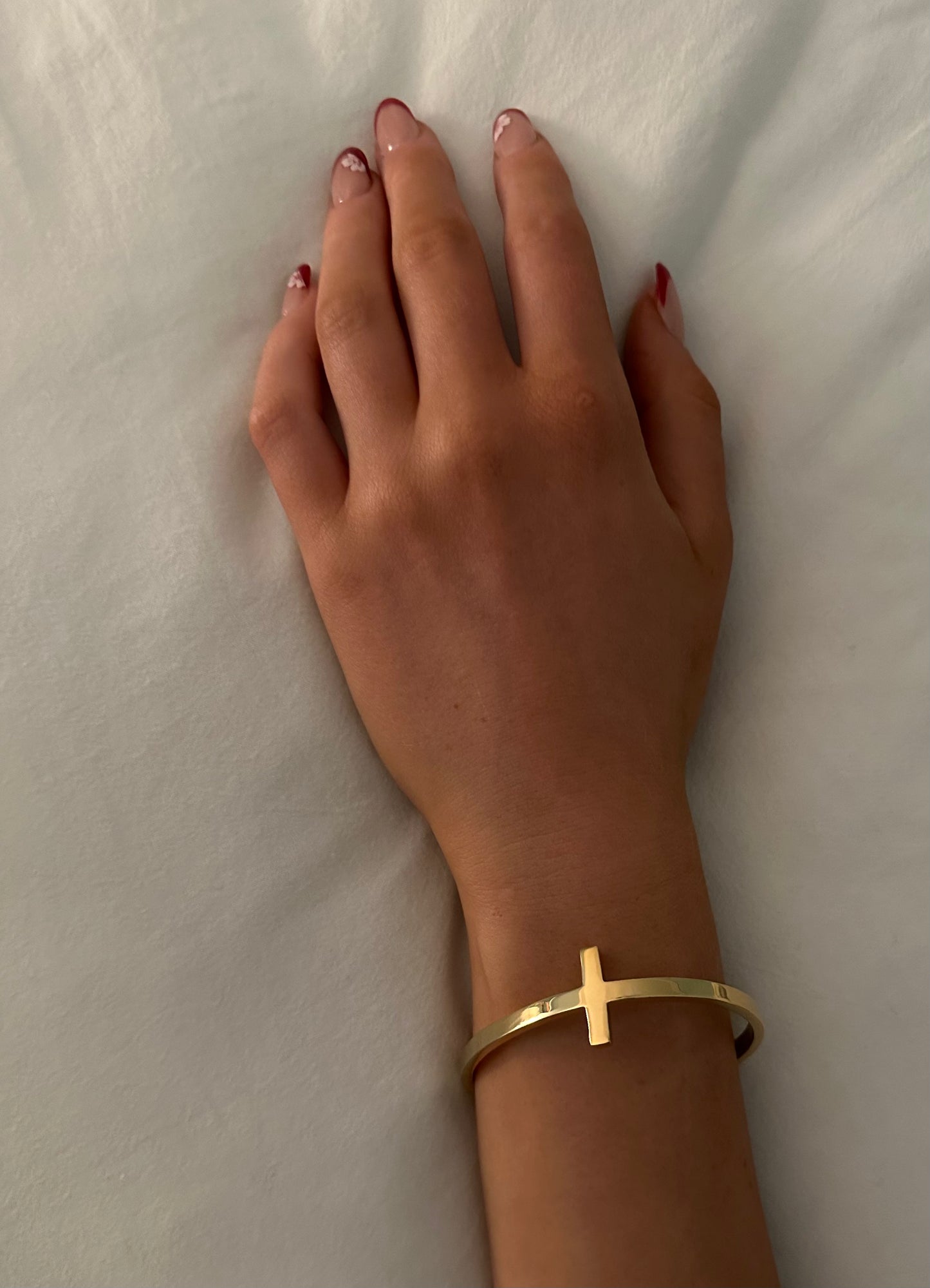 Haley Cross Bracelet - Our Haley Cross is Stainless Steel with 18K Overlay. C-shape open bangle for easy ware.