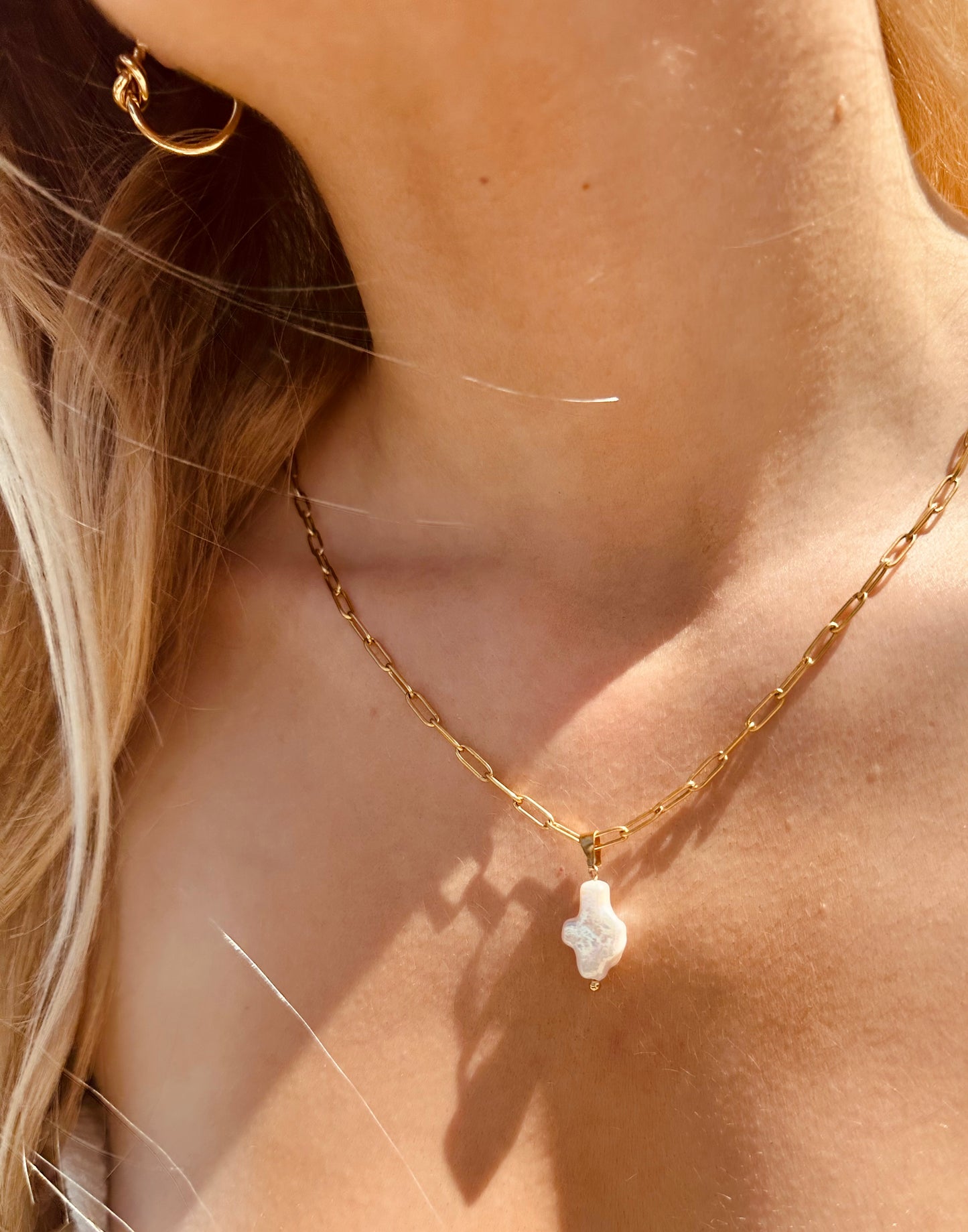 Love Knot - Our Love Knot Hoop is a staple for everyday to elevate your look. Gold over Stainless Steel Tarnish Free