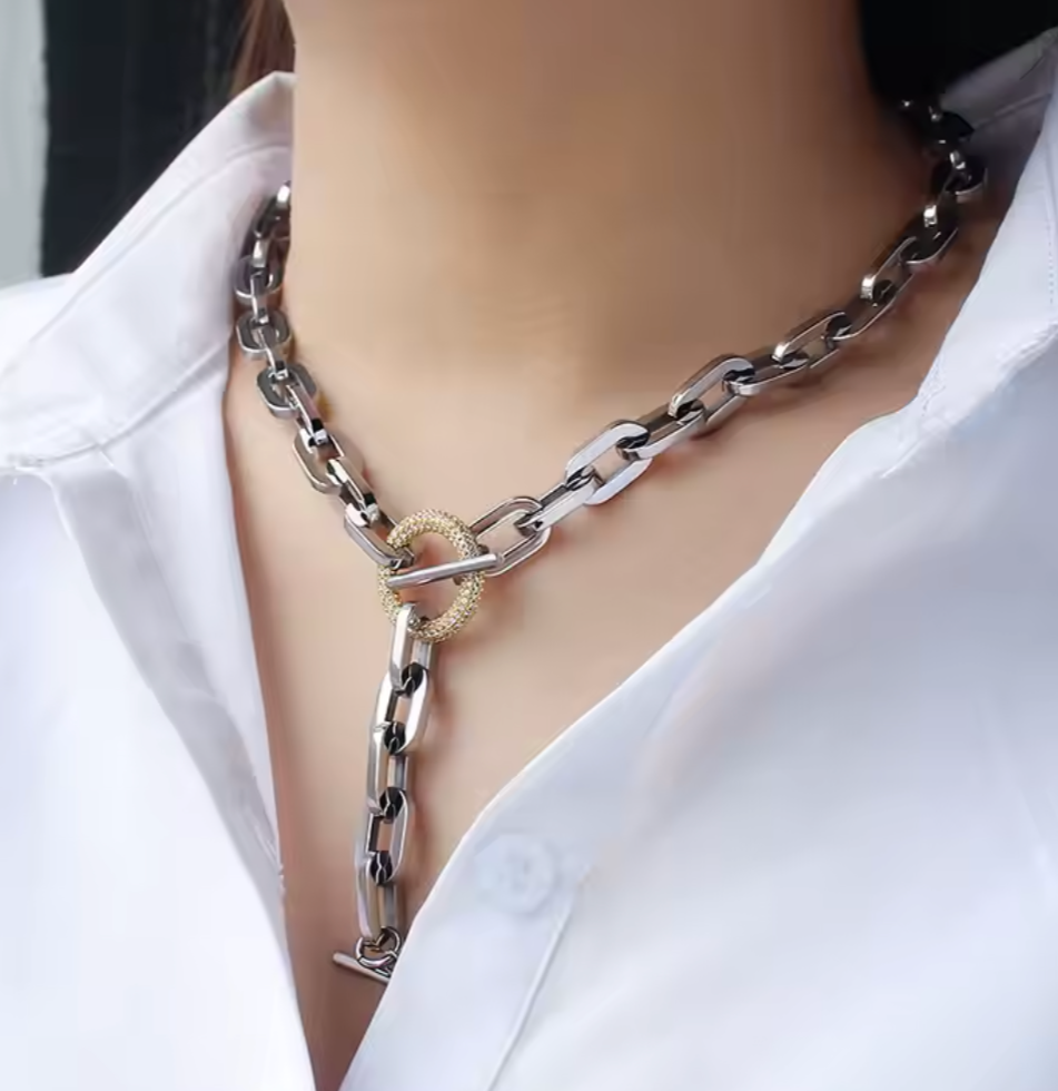 Tiffany - Tiffany is elegant and timeless. Thick stainless links with a gold pave sparkly ring and toggle will elevate a casual look and take it up a notch. A BB classic
