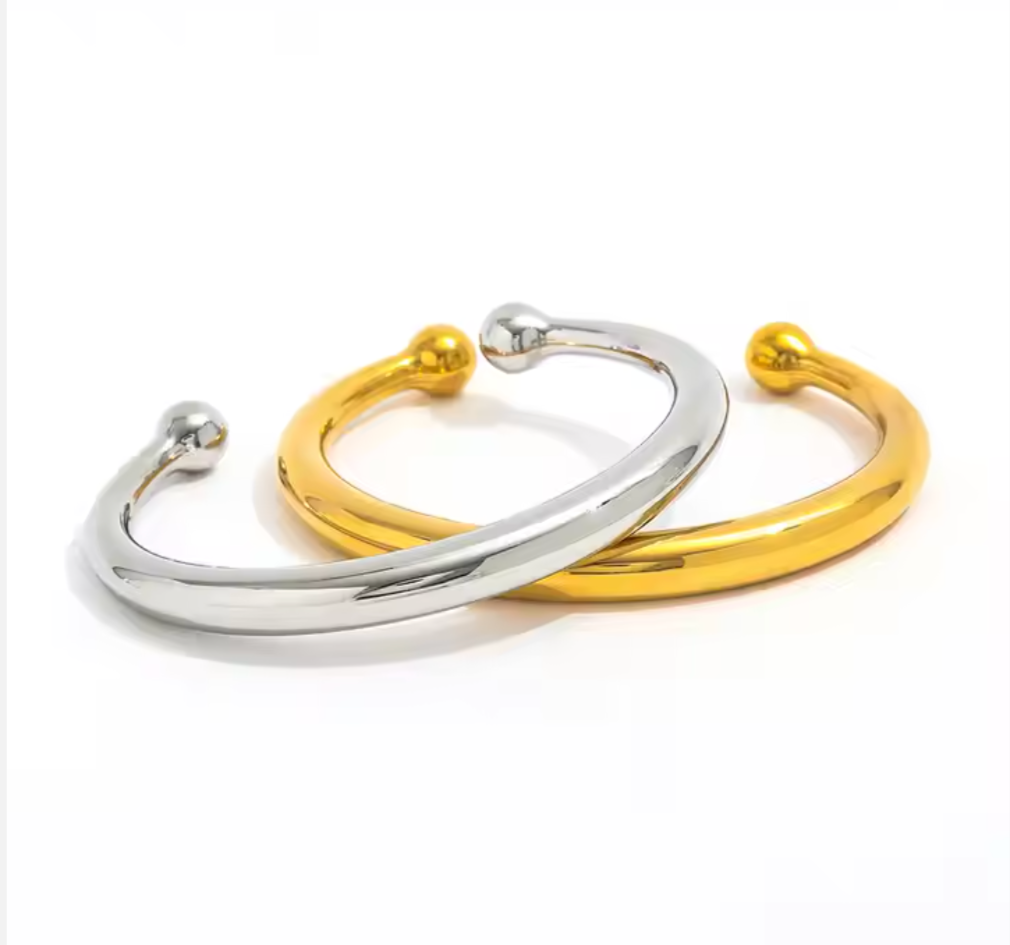 Patricia - Our Patricia bangle cuff named after the OG BOUJEE Babe, my beautiful Mom! Replicated after her hand made 18K bangles designed by my Grandfather in Venezuela when she was a small child.