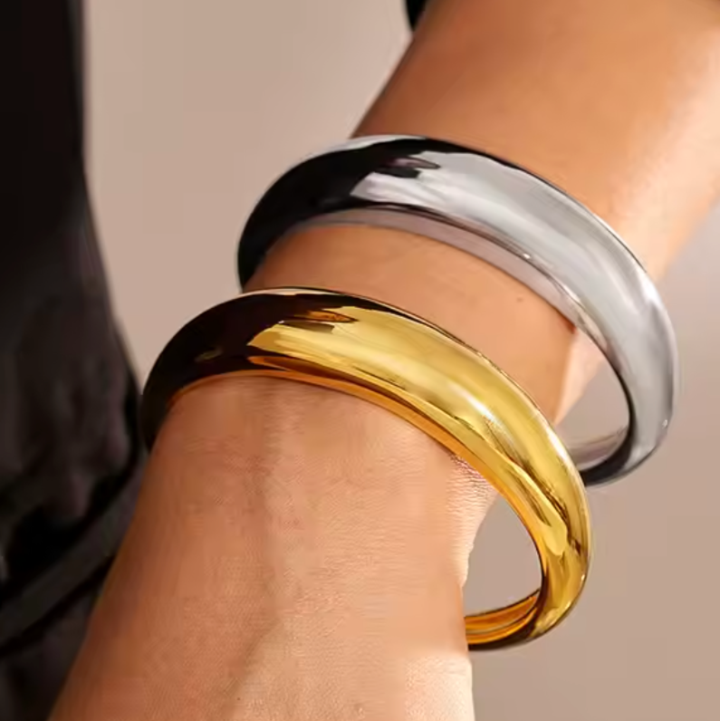 Luna - Our Luna adds a touch of ethereal charm to any outfit with its bold crescent moon shape. Elevate your jewelry collection by stacking her with your favorites or let her be the star of the show all on her own.