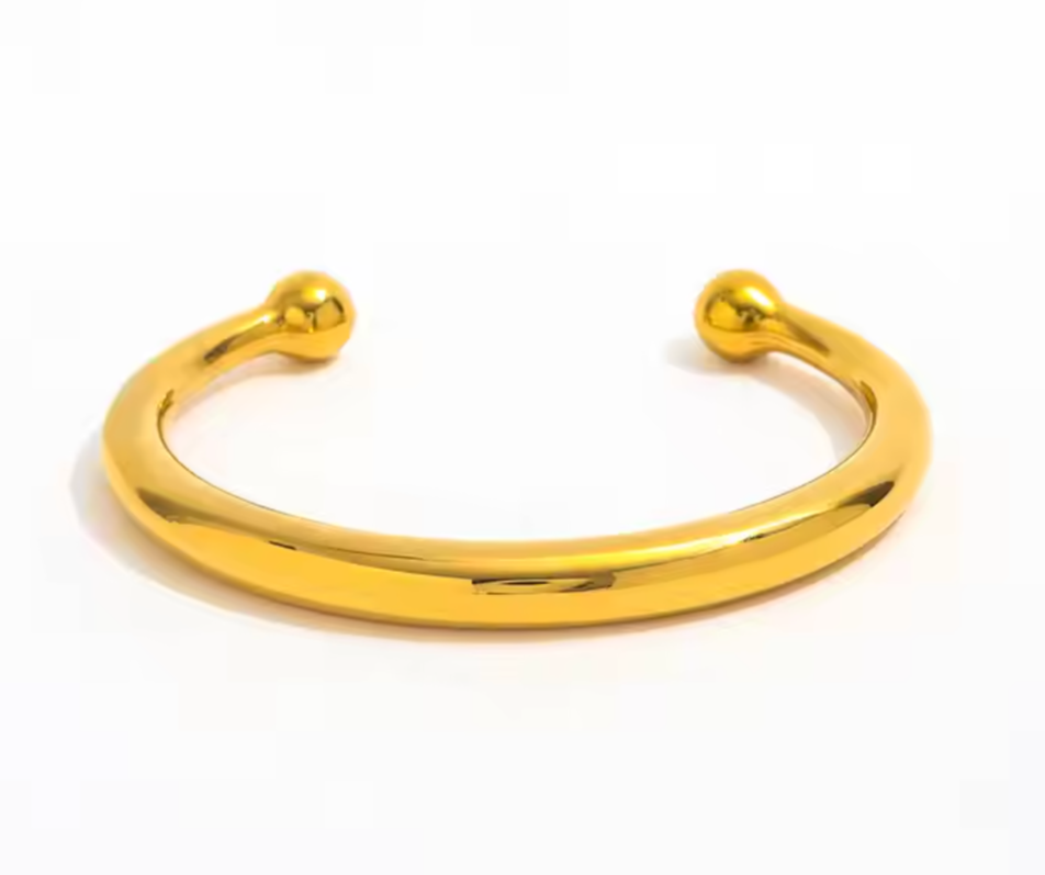 Patricia - Our Patricia bangle cuff named after the OG BOUJEE Babe, my beautiful Mom! Replicated after her hand made 18K bangles designed by my Grandfather in Venezuela when she was a small child.