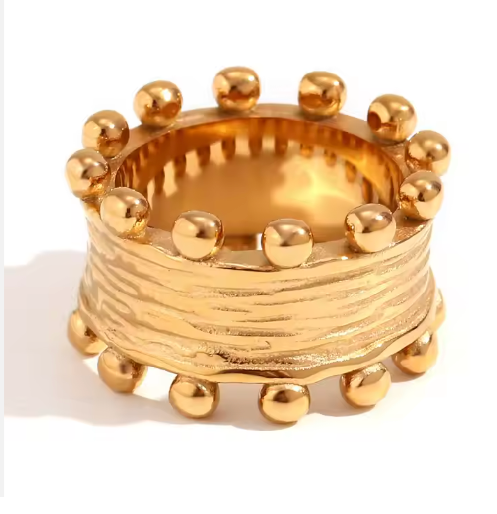 Elizabeth - Our Elizabeth ring is regal like her name. Resembling a crown, she is delicately crafted of durable stainless steel coated in 18K gold for a tarnish free long lasting finish. Made specifically for our Boujeest Queens.
