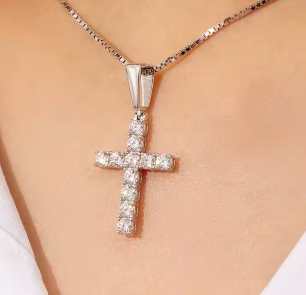Faith - Faith is our luxe 925 sterling silver & moissanite pendant cross necklace crafted with brilliant D VVS1 moissanite stones. 16" with a 2" extender & claw clasp. Layer her with our Eve Tennis Necklace to stand out both on and off the courts.