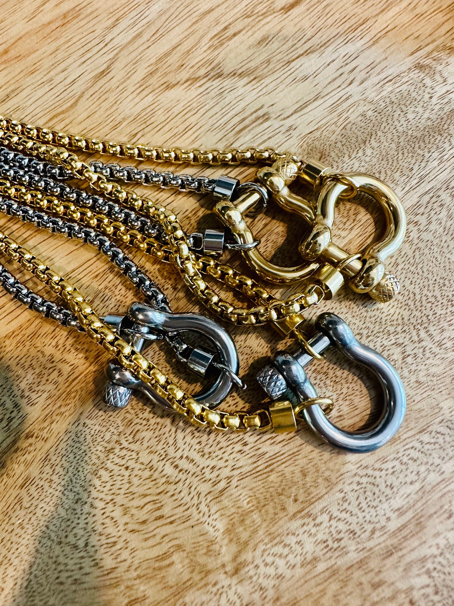 Hunter - Our Hunter Necklace is a box chain with a horsebit screw closure in Gold/Silver over Stainless Steel