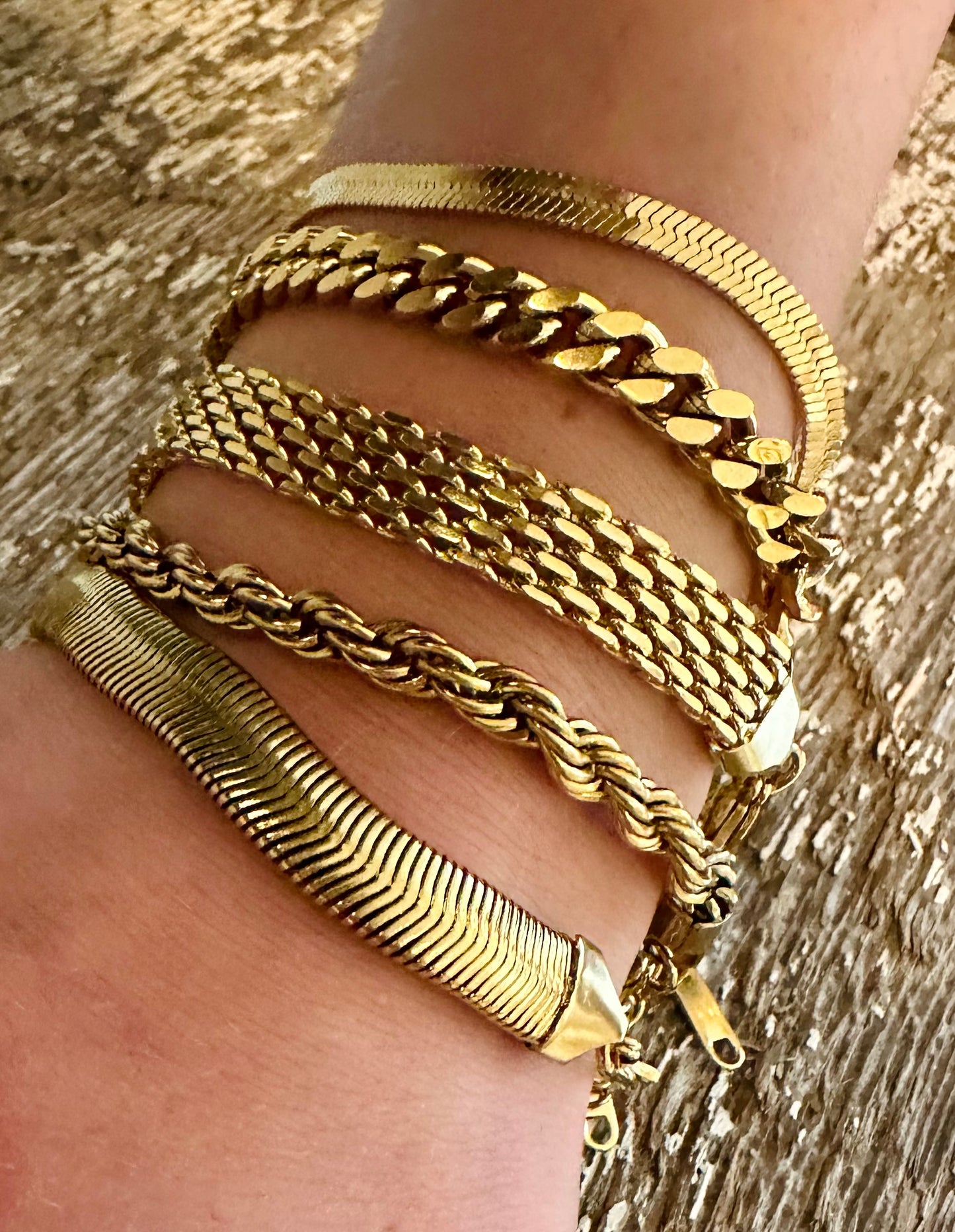 The Vanessa Stack - Our Vanessa Stack is a set of 5 individual beauties with adjustable chain closures that can be worn individually or altogether for a bold boujee look!  Non Tarnish Gold over Stainless Steel.